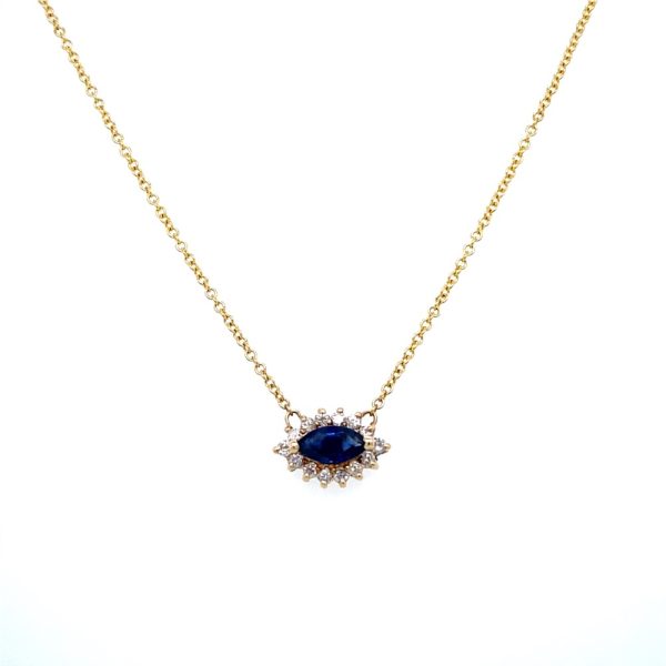 Estate Piece: 14k Yellow Gold Sapphire and Diamond Halo Pendant